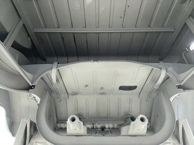 1963 23 window deluxe vw bus under body in bare metal silver lining auto restoration